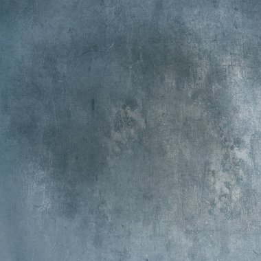 Arka plan için eski bir beton duvar dokusu. Mavi duvar arkaplanı. Boş bir işyeri. Tozlu arka plan. Eski bir duvar, çimento veya alçı dokusu. Tüttür. Sis. Klasik arka plan. İmpo