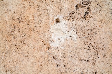 Tuff taşı yüzeyinin kaba doğası. İnşaat, inşaat ve yenileme için malzeme olarak kullanılıyor. Doğal doku veya arkaplan