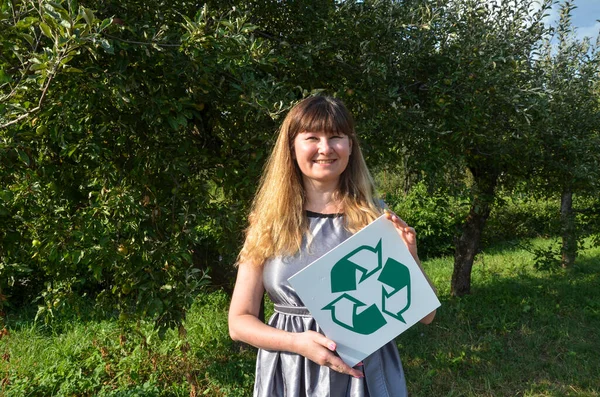 Smiling Volunteer Young Woman Grey Dress Holding Recycling Sign Natural — Photo