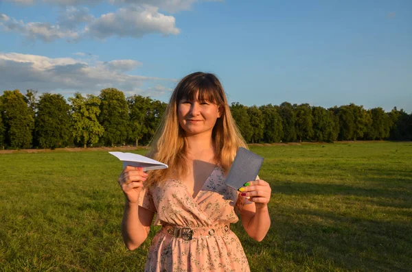 Portrait Positive Cheerful Smiling Girl Holding Paper Airplane Passport Her — Photo