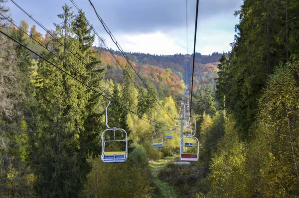 Empty Aerial Chair Lift Colorful Foliage Autumn Mountain Forest — Stockfoto