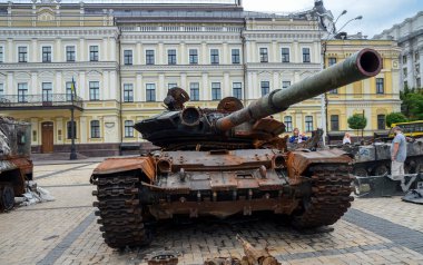 Crushed russian T-72B tank at the exhibition of destroyed russian equipment in Kyiv. 
