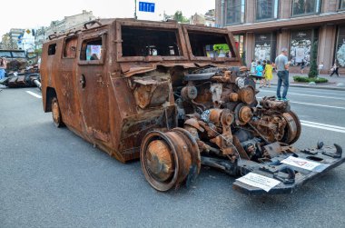 Destroyed russian army all-terrain Tigr-M (Tiger) infantry mobility vehicles parked in the central Khreshchatyk street during exhibition in Kyiv