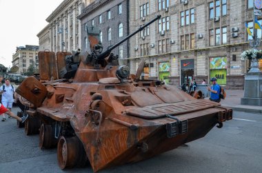Rusty, russian combat military equipment destroyed by Ukrainian defenders on display on the main street in Kyiv