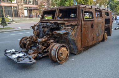 Destroyed russian army all-terrain Tigr-M (Tiger) infantry mobility vehicles parked in the central Khreshchatyk street during exhibition in Kyiv