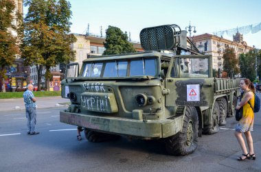Crushed 9T452 transporter-loader for 9K57 Uragan (Hurricane) Multiple Rocket Launcher System MLRS during an exhibition displaying destroyed russian military vehicles