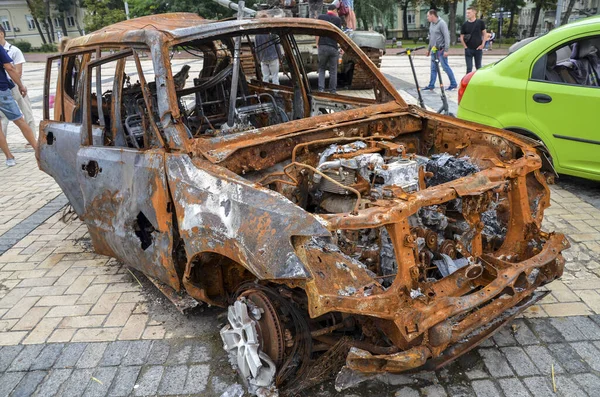 A burnt-out car destroyed as a result of shelling by Russian invaders. War in Ukraine