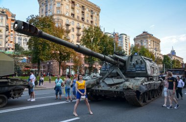 Destroyed russian 2S19 'Msta-S' Self-Propelled Mortar exhibited with other crushed Russian military vehicles on Khreshchatyk street in center of Kyiv