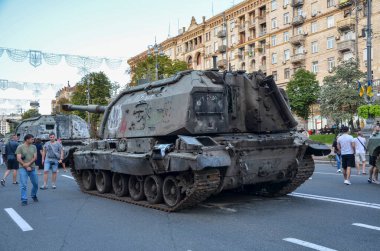 Destroyed russian 2S19 'Msta-S' Self-Propelled Mortar exhibited with other crushed Russian military vehicles on Khreshchatyk street in center of Kyiv