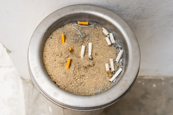 Bangkok, Thailand -July , 15, 2021 : Cigarette butts. Smoking is bad for your health at Bangkok, Thailand.