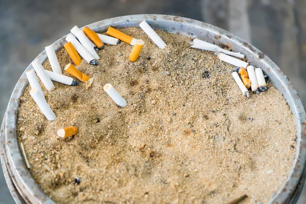 Bangkok, Thailand -July , 15, 2021 : Cigarette butts. Smoking is bad for your health at Bangkok, Thailand.