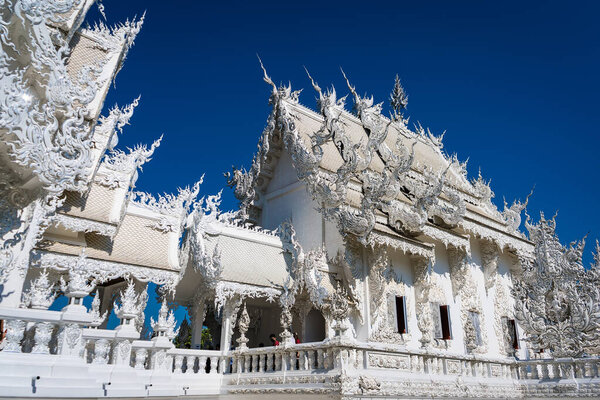 Chiang Rai, Thailand - January, 09, 2022 :Famous Thailand temple or grand white church Call Rong Khun Temple,at Chiang Rai province, northern Thailand.