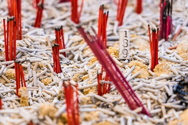 The numbers on the incense sticks dotted on the incense burner It is a gamble that Thai people have played for a long time.