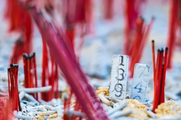 The numbers on the incense sticks dotted on the incense burner It is a gamble that Thai people have played for a long time.