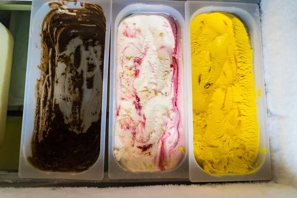 Assorted flavor ice cream in display freezer