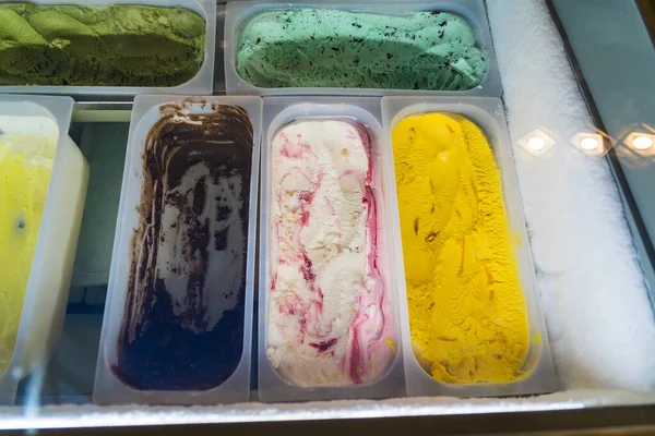 Assorted flavor ice cream in display freezer