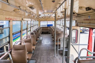 Bangkok, Thailand - May, 29, 2022 : Empty leather seat inside the vintage auto bus of bangkok metropolis, thailand transportation