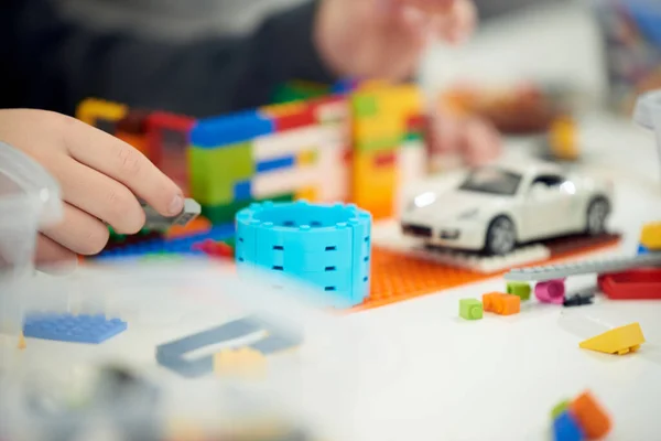 Hands Child Who Plays Plastic Colored Children Constructor — Fotografia de Stock