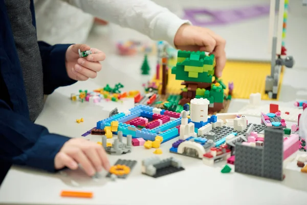 Hands Child Who Plays Plastic Colored Children Constructor — Foto Stock