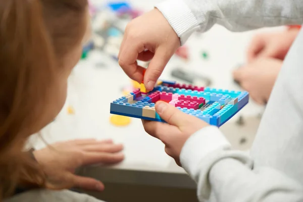 Hands Child Who Plays Plastic Colored Children Constructor — Fotografia de Stock