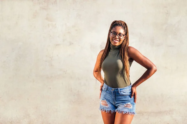 Young Black Woman Poses Smiling Hands Her Hips Looking Camera — 스톡 사진