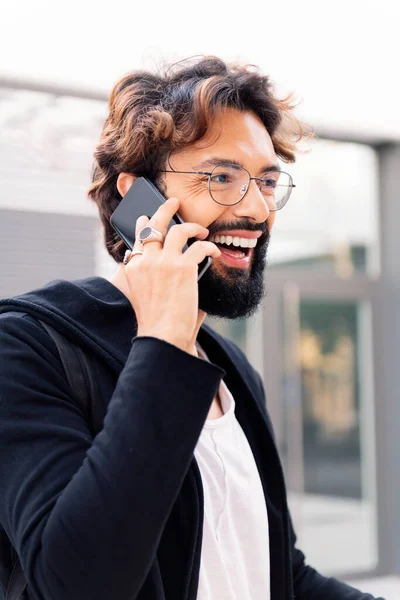 Smiling Young Man Talking Happy Mobile Phone City Concept Technology — Zdjęcie stockowe
