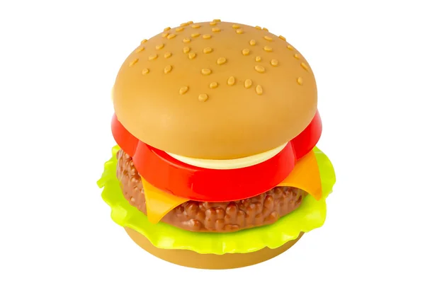 Plastic burger isolated on white background. Plastic cheeseburger. Food is a surrogate. Isolate on a white background. — Stock Photo, Image