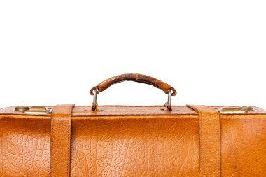 Kahverengi bir valizin tepesinde. Beyaz bir arka planda bavul sapı. Yüksek kalite fotoğraf