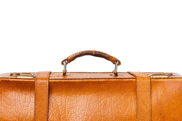 Kahverengi bir valizin tepesinde. Beyaz bir arka planda bavul sapı. Yüksek kalite fotoğraf