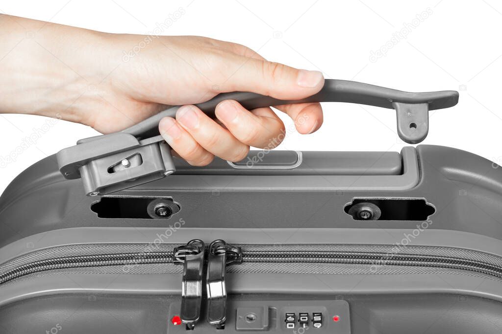 Broken suitcase handle. Broken travel suitcase. Suitcase handle in hand. High quality photo