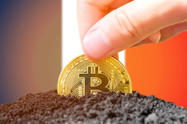 Legalization of bitcoins in France. Bitcoin landing in the ground against the background of the flag of France. France - investment in cryptocurrency. . High quality photo