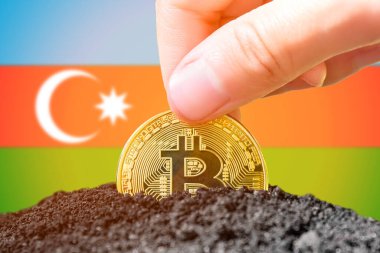 Legalization of bitcoins in Azerbaijan. Planting Bitcoin in the ground against the background of the flag of Azerbaijan. Azerbaijan - investment in cryptocurrency. . High quality photo