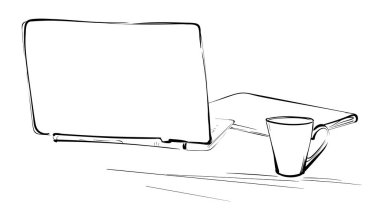 Bardak ve dizüstü bilgisayar ofisteki masada.