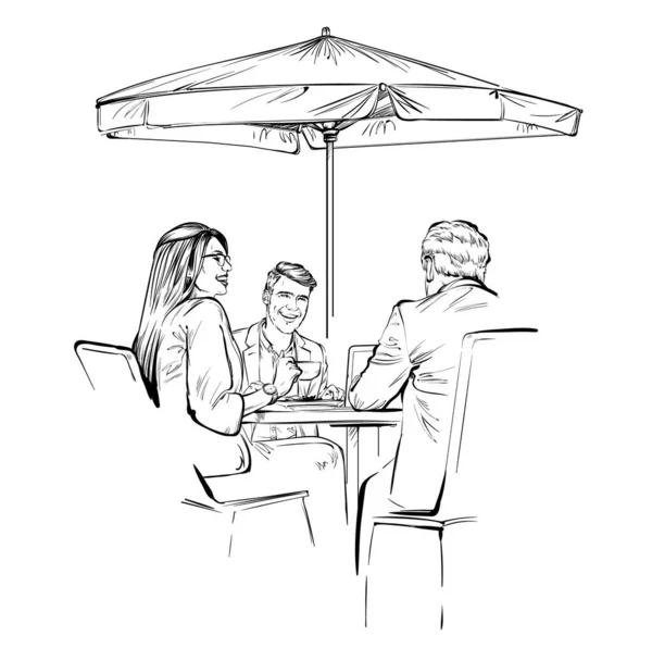 Ofis çalışanları bir kafede oturup kendi aralarında neşeyle konuşurlar.