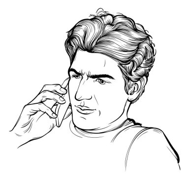 Genç adam cep telefonuyla konuşuyor.