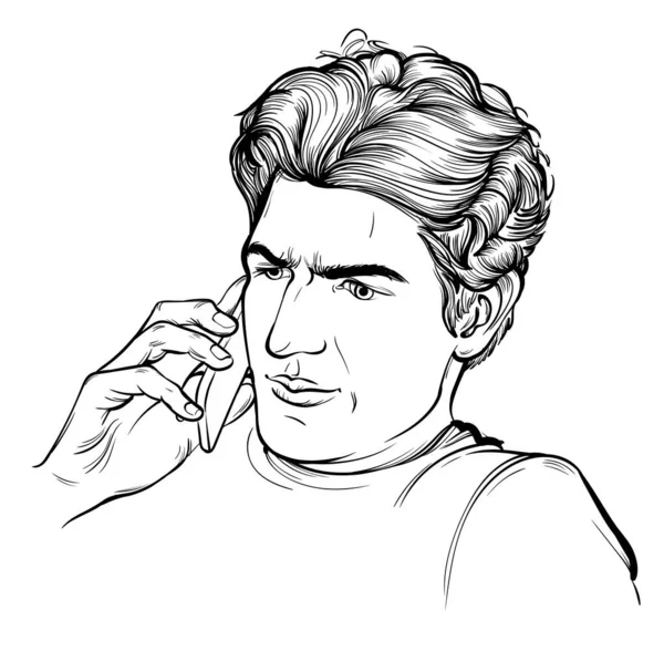 Genç adam cep telefonuyla konuşuyor.