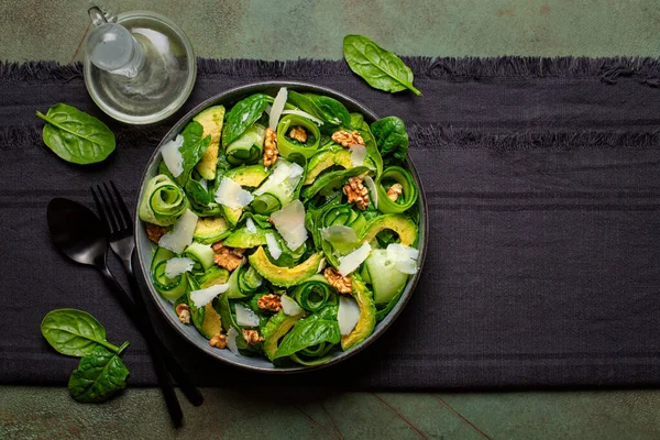 Spinach Avocado Cucumber Walnut Parmesan Cheese Salad Olive Oil Top — Stock Photo, Image