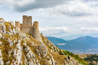 The Castle of Rocca Calascio is a mountain top fortress or rocca  in the Province of L'Aquila, Abruzzo, central Italy, Europe. Located in the Gran Sasso e Monti della Laga National Park. Landskape, Panoramic view.