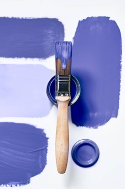 Choosing wall paints clipart