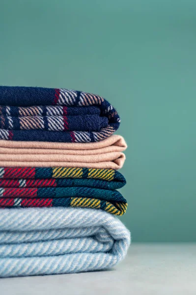 Stack of woolen checked blankets — Stock Photo, Image