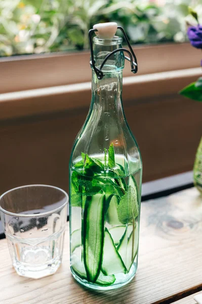 Tasty and refreshing cucumber water served in cafe, detox and weight loss drink