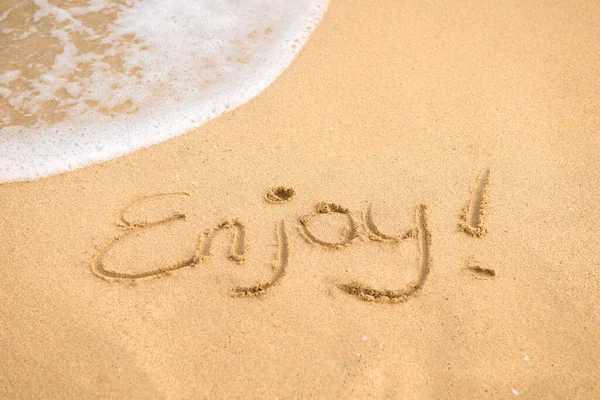 Handwritten Word Enjoy Golden Sand Vacation Happiness Concept — Zdjęcie stockowe