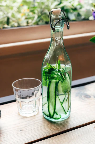 Tasty and refreshing cucumber water served in cafe, detox and weight loss drink