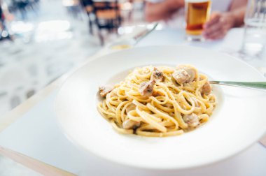 Creamy mushroom Spaghetti pasta, Vegan option, served in restaurant