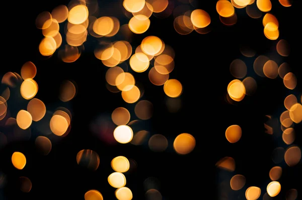 Bokeh Abstracto Amarillo Hecho Luces Navidad Sobre Fondo Negro Aislado — Foto de Stock