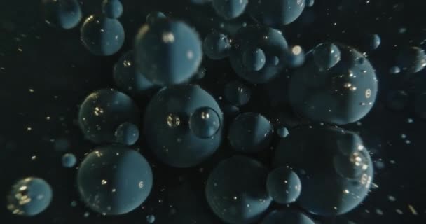 Bolhas de tinta azul caindo — Vídeo de Stock