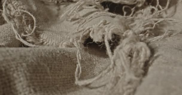 Close Up Dolly Shot Over Beige Sack Material — Stock Video