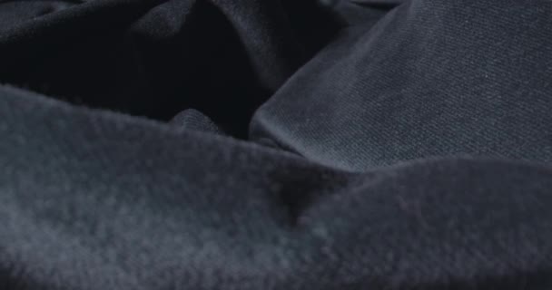 Close Up Dolly Shot Over Black Corduroy Material — Stock Video
