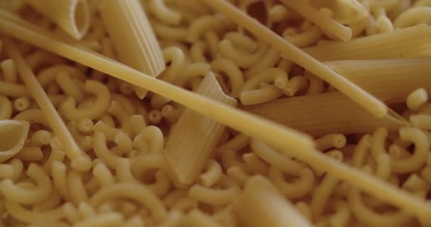 Dried Pasta Shapes Of Macaroni, Spaghetti And Penne — Stock Video