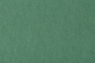 Yeşil kağıt arka plan, renkli kağıt. Sanat projelerinde doku olarak kullanılabilir.